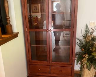 This is a nice display cabinet or China cabinet!