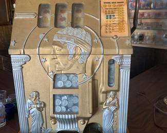 Mills Roman Head Slot machine full of coins!