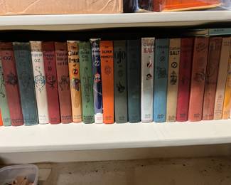 Hundreds of vintage children’s books, including this collection of Oz books.