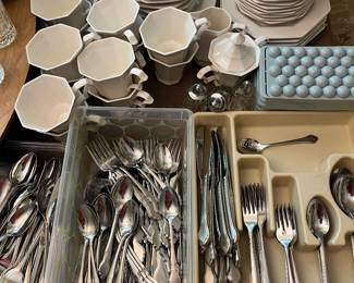 Set of Nikko “Classic Collection” dinnerware (see preceding photo for the other half of the set); multiple sets of silverware.