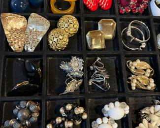 Hundreds of pieces of vintage costume jewelry.