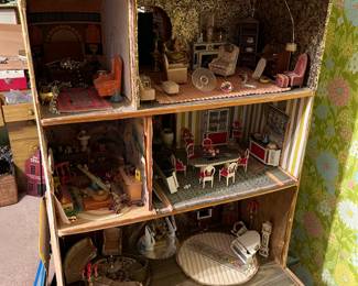 Large vintage dollhouse (see following photo for a view of the other side).