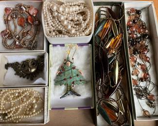 Hundreds of pieces of vintage costume jewelry.
