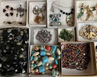 Hundreds of pieces of vintage costume jewelry.