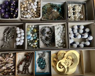Hundreds of pieces of vintage costume jewelry.