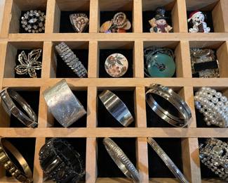 Hundreds of pieces of vintage costume jewelry.
