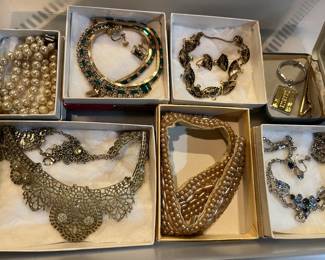 Hundreds of pieces of vintage costume jewelry.