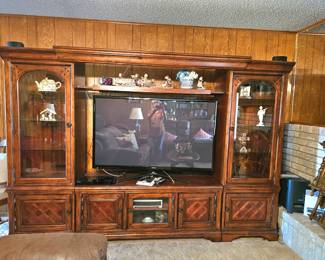 Close look of super-sized entertainment center , comes apart  and flat screen