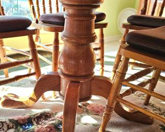 bottom of the dining Romm table before carpet was adjusted 