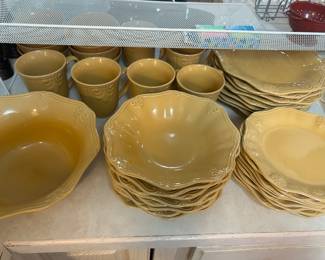 SO MANY SETS OF DISHES