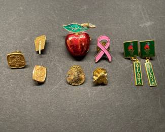 Vintage pins: Fairfax County Schools pins and 1996 Atlanta Olympics earrings