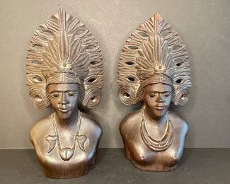 Carved wood busts