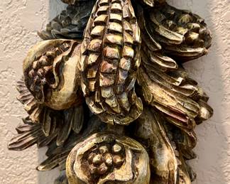 LOVE THE CORN AND FRUIT CARVINGS.