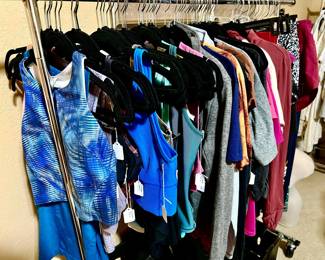 RACK FULL OF PRE-WORN LULULEMON
