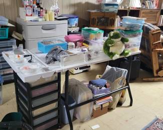 Crafting table.   Lots of scrapbook and stamp items 