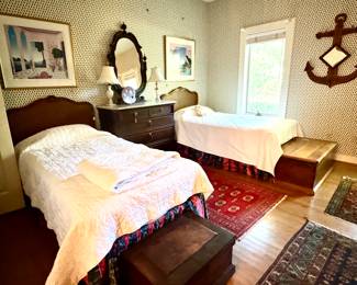 Twin Cane Beds with new bedding, Thomas McKnight Artwork, Antique rugs, Cedar chests, blanket chests, vintage mirrors