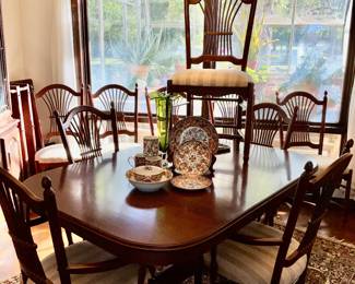 Dining table, 4 leaves, 12 chairs.  5ft table w/ 4 - one foot