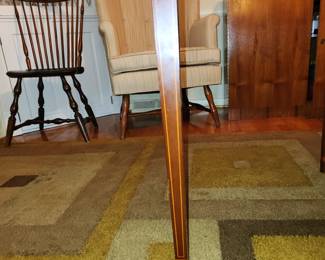 Drop leaf, gate-leg dining table by Biggs. Leg detail