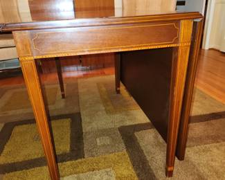 Drop leaf, gate-leg dining table by Biggs