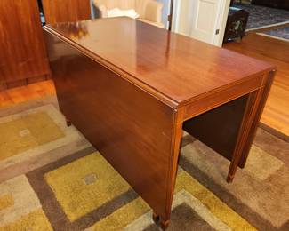 Drop leaf, gate-leg dining table by Biggs