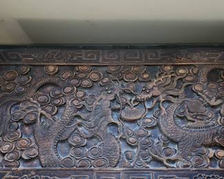 large, ornate, carved trunk (top)