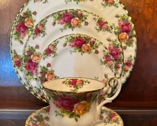 Royal Albert: "Old County Roses" 8, 6 piece Place-Settings minus 1 Cereal Bowl, plus 6 piece Hostess Set and 2 Decorative Pieces for a total of 55 Pieces.