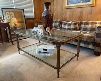1963 Cobra Ford Racing Poster, Glass and metal coffee table,   Vintage plaid sofa and loveseat Enlauder Triangle, Ronzan Cheetah Couple Sculpture, Bose wave radio with power cord (no remote)
