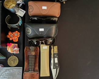 Vintage sterling watch cuff, House Pins by Lucinda, Desert Storm Cards, Carrera Porsche Sunglasses, Crown Sterling Weighted Candlesticks, Ampersand Brass belt buckle, America’s Pioneer Heritage Colt Navy belt buckle, Ray Ban RB2132, Ray Ban glasses case, Vintage Liz Claiborne flower brooch

