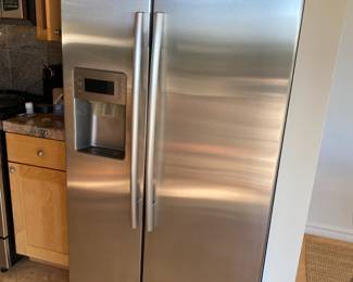 Samsung stainless steel side-by-side refrigerator. Asking $600 or best offer