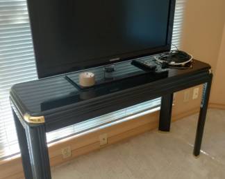 Several TVs including this one