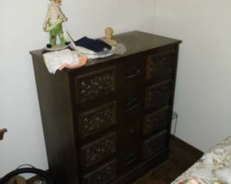 Matching tall dresser, and these pieces are classic one of a kind originals.  Just like the crappy photo.