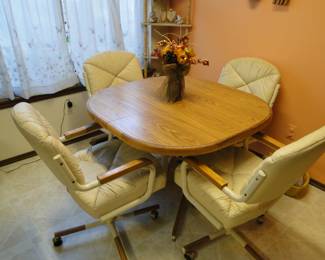 Yes!! 1980's rolling chairs, and Formica table, game night and dinner can now be brought back to the tradition of excellence
