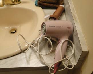 Mini blow dryer and curling iron