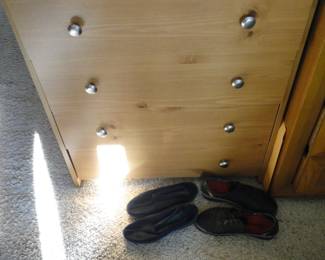 Thank goodness we can move on from all those horrible pictures of the stackable cubes with random clothing and get to this lovely dresser with shoes on the floor