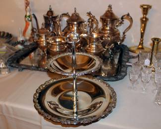 Silver two tier tray, Waterford Crystal glassware, Brass candlesticks and silver tea set with tray. 
