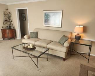 Beautiful couch, Better Homes and Gardens brand. It is in NEW condition and very comfortable. 
Nice modern glass top tables 