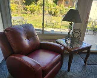 Red Leather chair, recliner/Rocker. Comfortable!