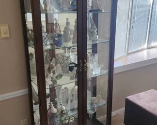 China cabinet with figurines 