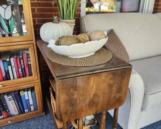 Cute vintage side table, planters all over the home, and autumn decor