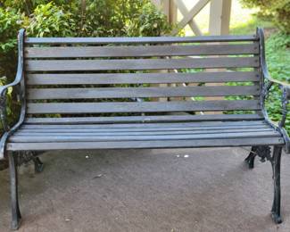 Iron and wood outdoor bench
