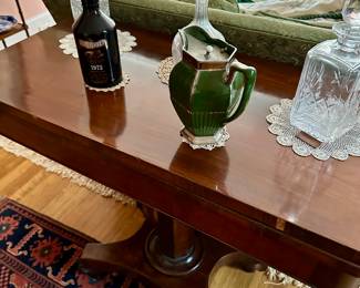 GLENTURRET BY LALIQUE, EARLY OVERLAY, DECANTERS ON A FLIP TOP MAHOGANY GAME TABLE.