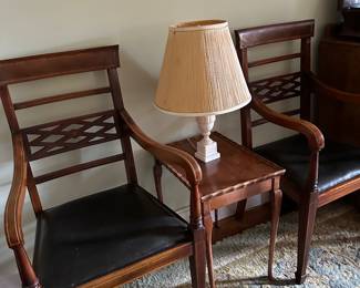 Two arm chairs four straight