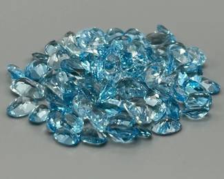 52.80 Carat Blue Topaz; Oval Faceted Cut; Assorted Lot of Loose Stones
