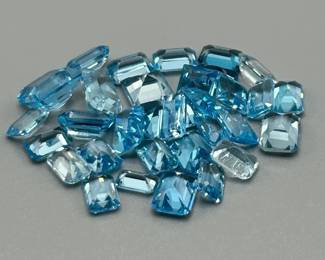 29.56 Carat Blue Topaz; Rectangular Emerald Cut - Various Color & Size Assorted Lot of Loose Stones