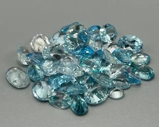 44 Carat Blue Topaz; Oval Faceted Cut - Various Color & Size Assorted Lot of Loose Stones