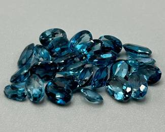12.18 Carat London Blue Topaz; Oval Faceted Cut - Various Size & Color Assorted Lot of Loose Stones