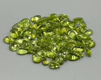 42 Carat Peridot; Pear Faceted Shape; Assorted Lot of Loose Stones