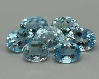 20.34 Carat Blue Topaz; Oval Faceted Cut - Various Size & Color Lot of 7 Loose Stones