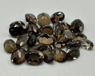 24 Carat Smoky Quartz; Oval Faceted Cut - Various Size & Color Assorted Lot of Loose Stones
