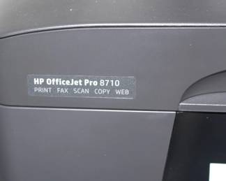 HP OfficeJet Pro 8710 Printer with ink cartridges.